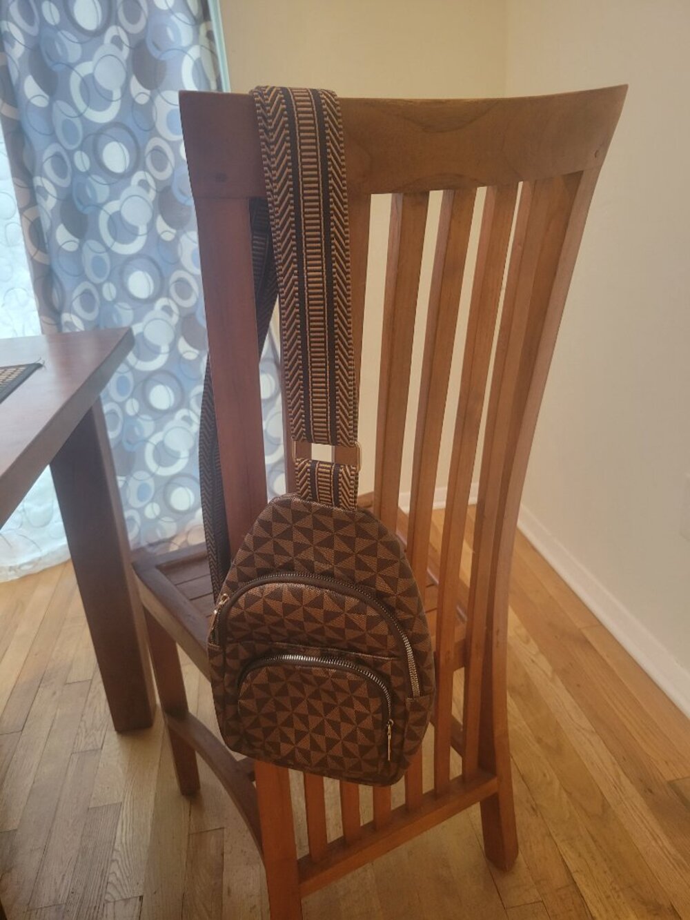 Pinwheel sling crossbody backpack/purse